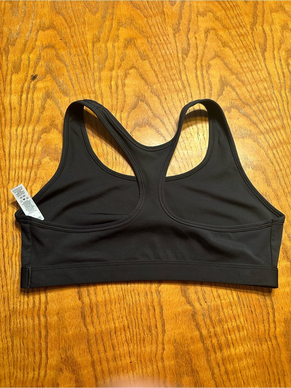 Nike Black Racerback Sports Bra with White Swoosh - Picture 2 of 3